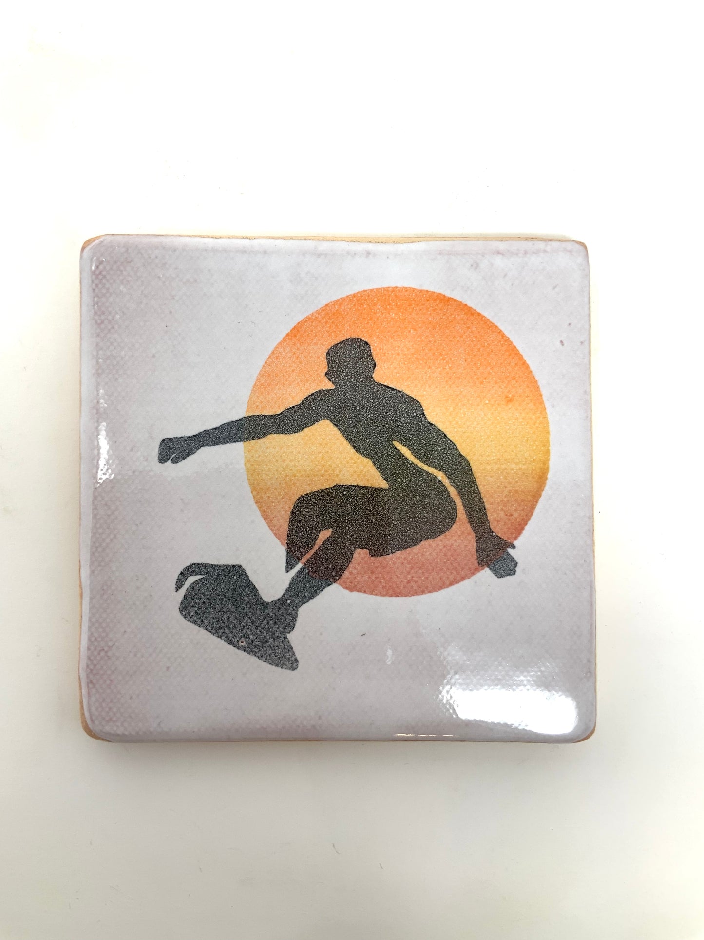 Surfer Dude Coaster -- orange, yellow, red